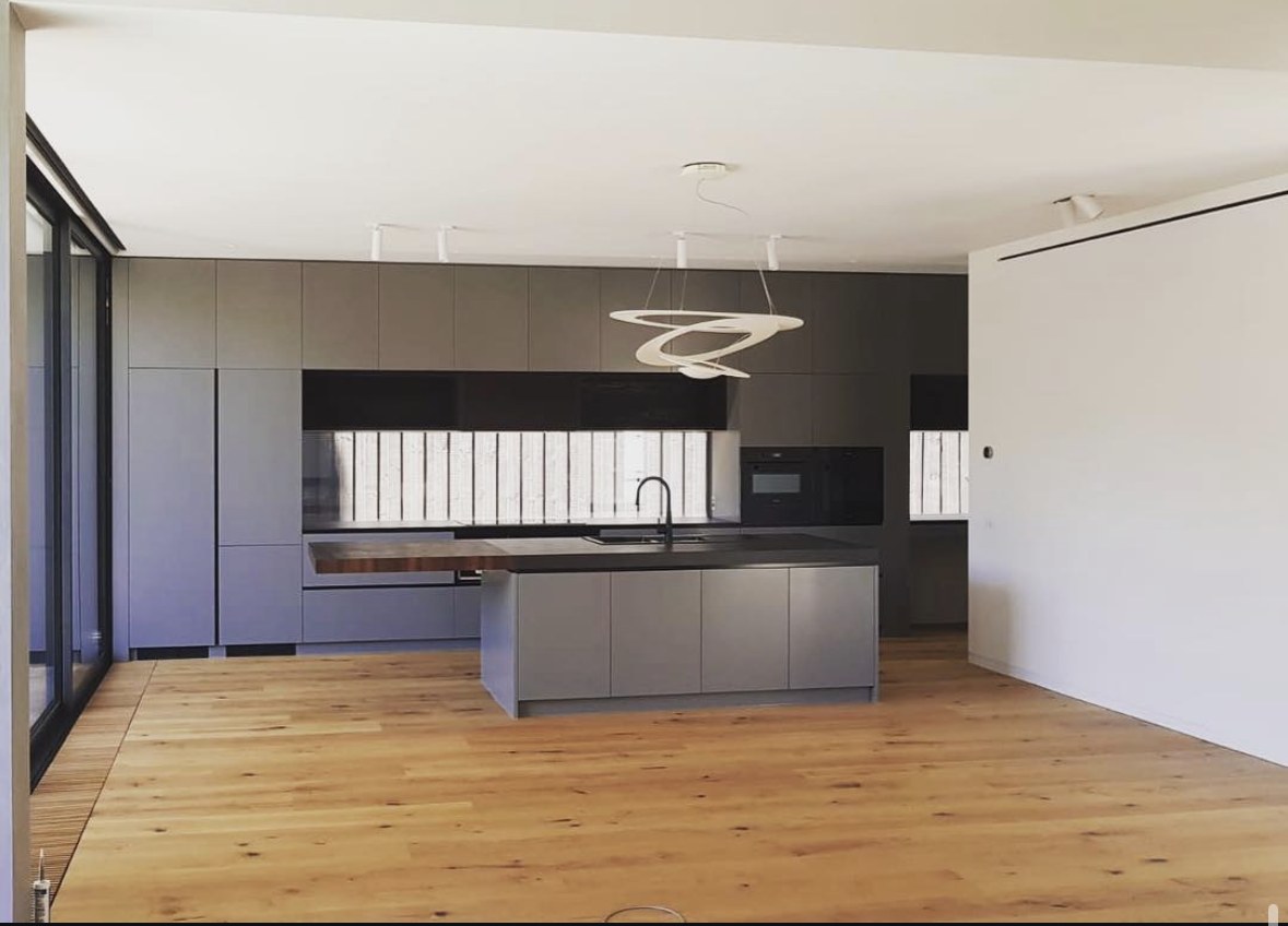 Kitchen and living space at a Clifton Hill residence